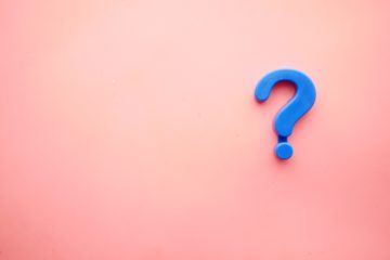 Question mark against pink background