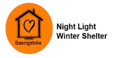 Night Light winter shelter logo of a house with a heart inside on an orange background
