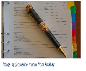 address book with pen on top
