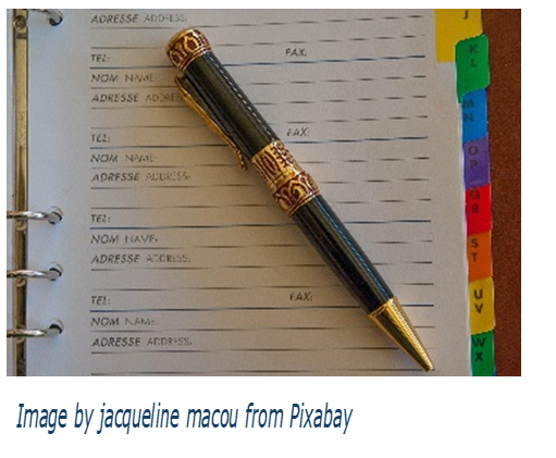 address book with pen on top