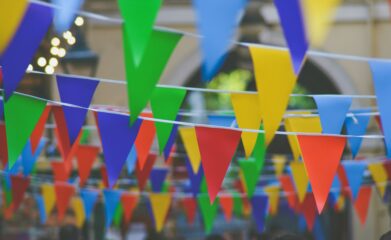 colourful bunting strings hanging up outdoors