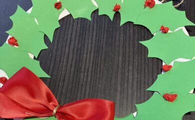 holly wreath made from green card and red tissue paper