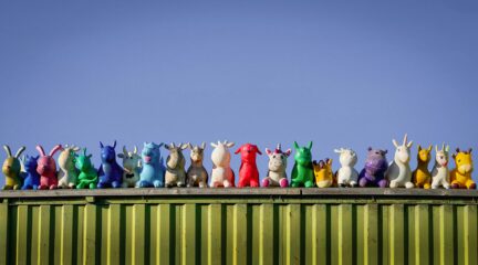 row of coloured inflatable toys